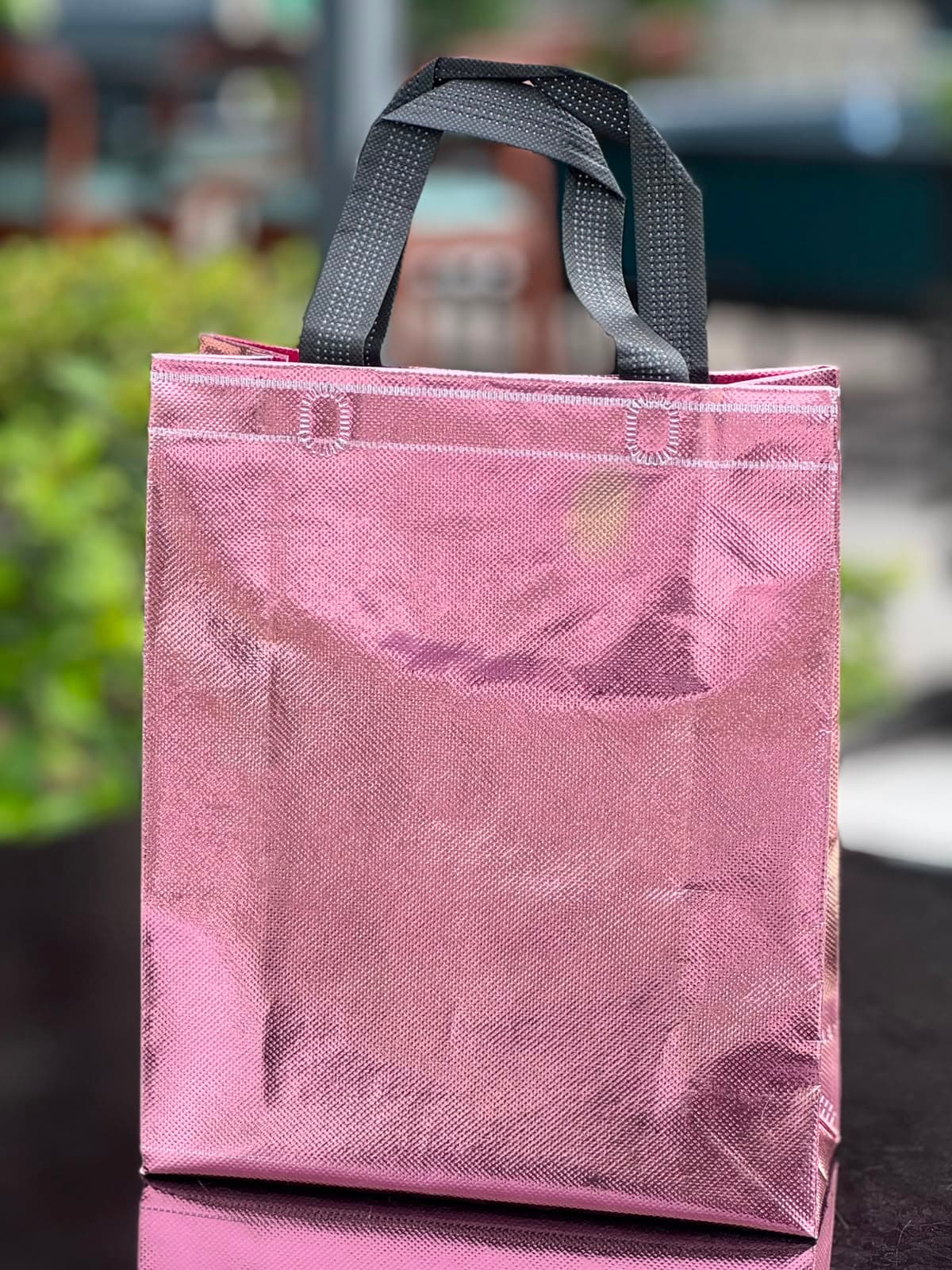 Rose gold metallic laminated bag manufactured by Maruti Bag Multipack